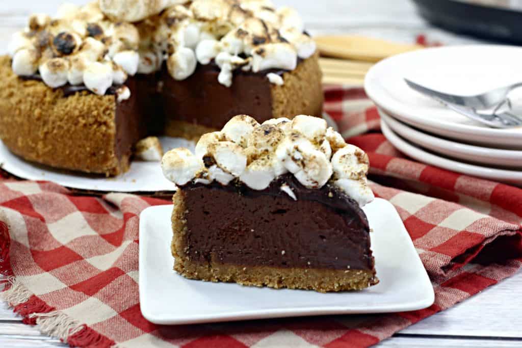 chocolate cheesecake slice with marshmallows on top 