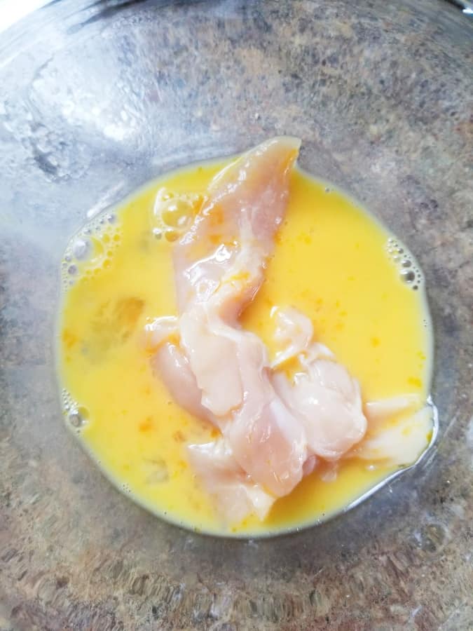 chicken tender in egg wash