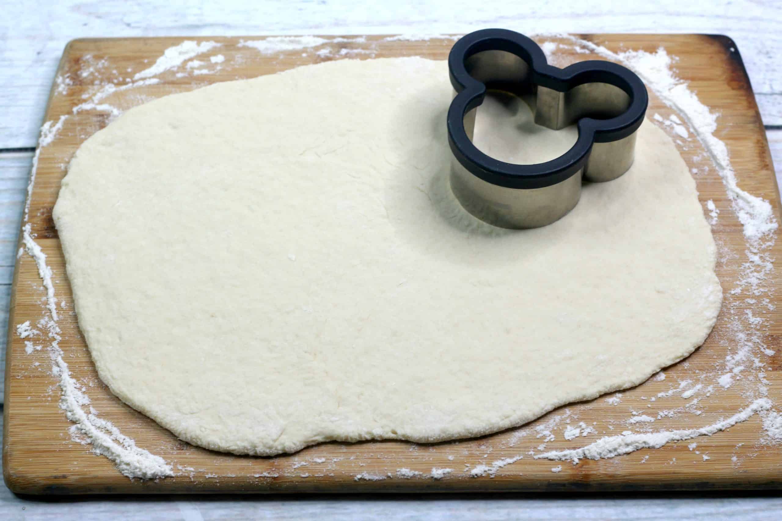 Rolled out dough with cookie cutter