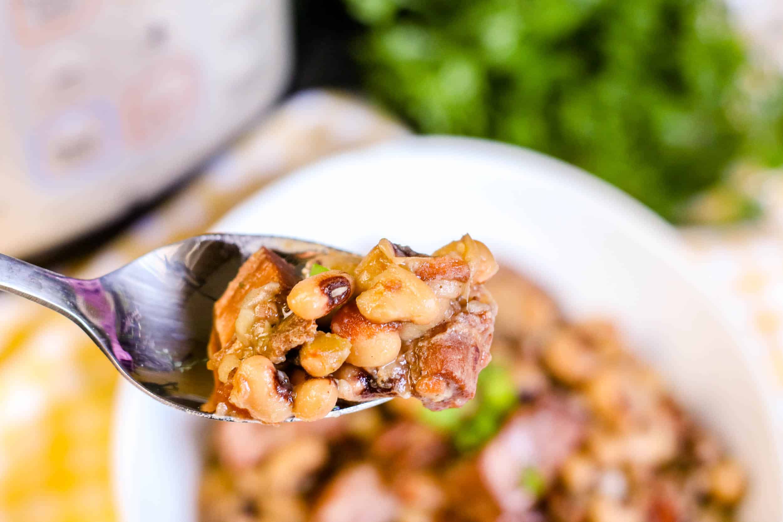 Instant Pot Spicy Black Eyed Peas with Sausage on fork