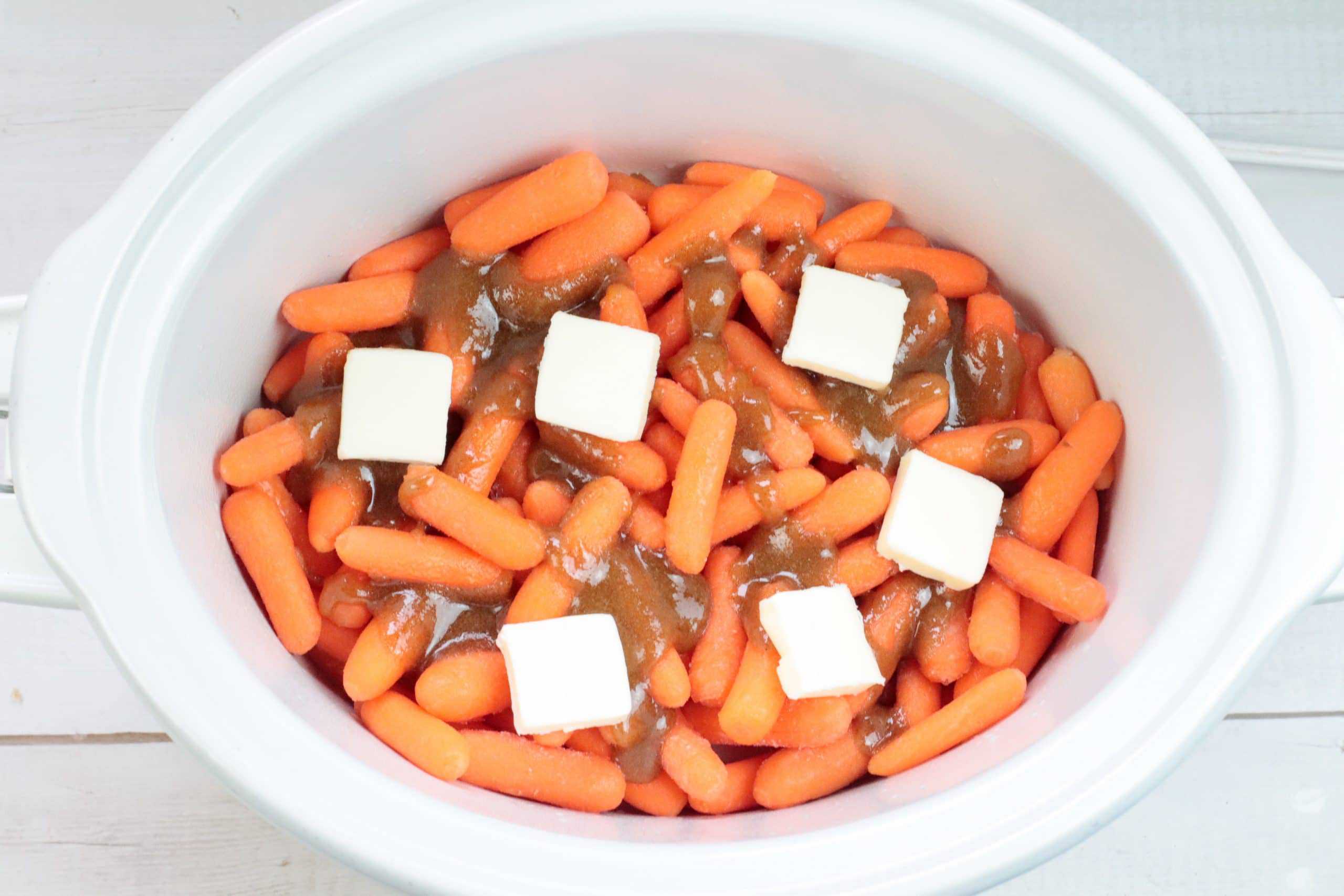 carrots, butter and brown sugar in slow cooker