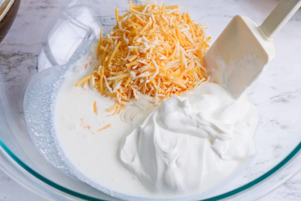sour cream, heavy cream and shredded cheese
