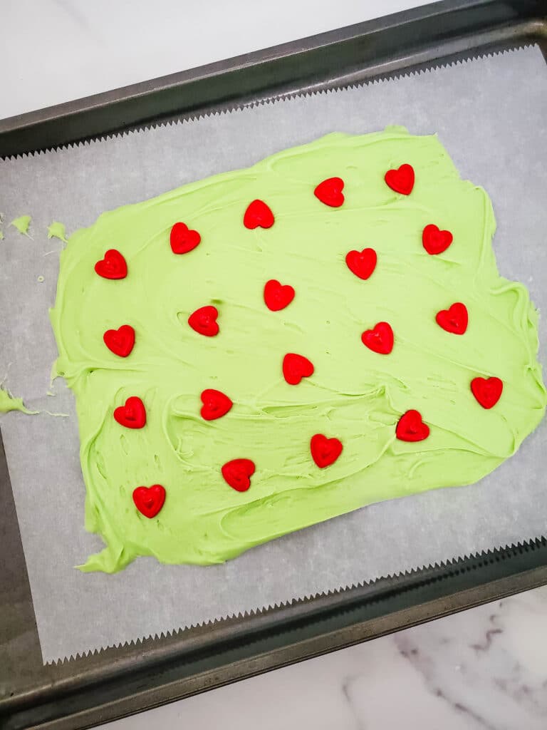 red candy hearts on a grinch bark