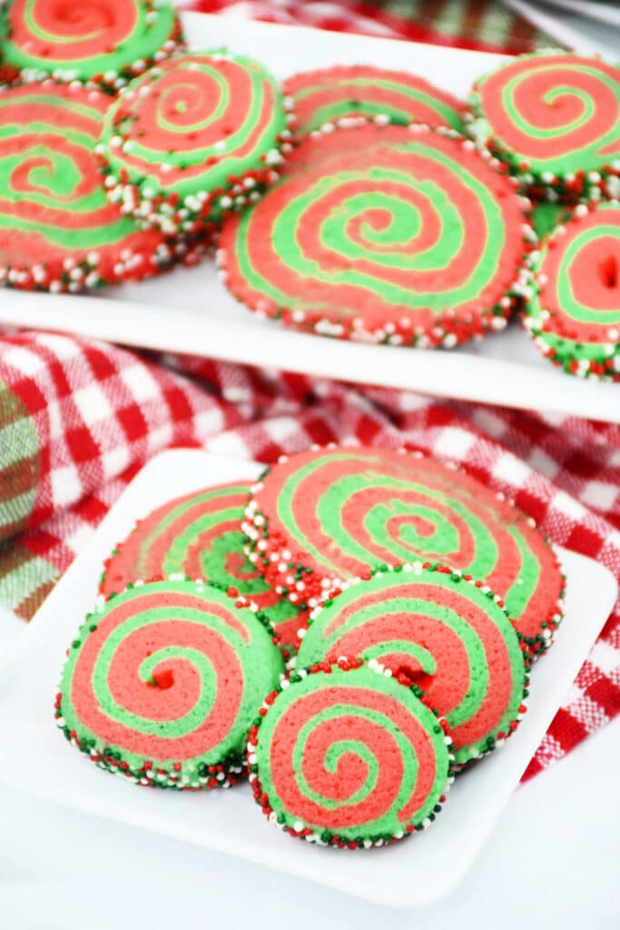 Plate of Whoville Christmas Pinwheel Cookies on a white square plate