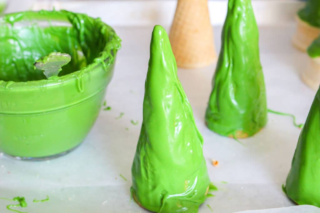 waffle cones in green candy melts