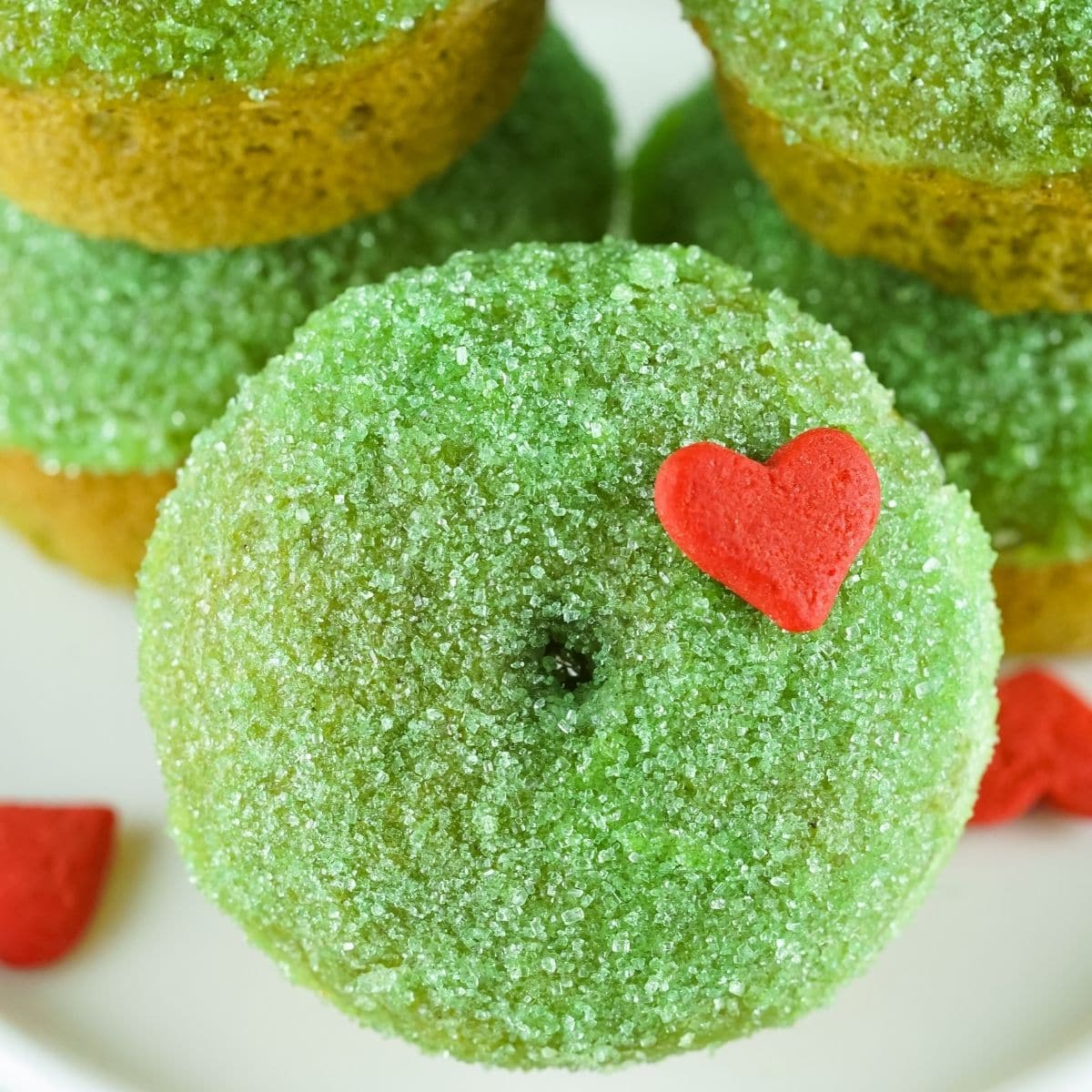 square image of grinch donuts