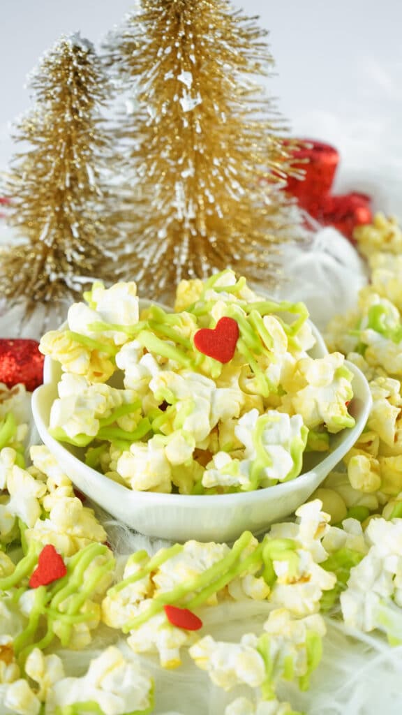 bowl of grinch candy covered popcorn