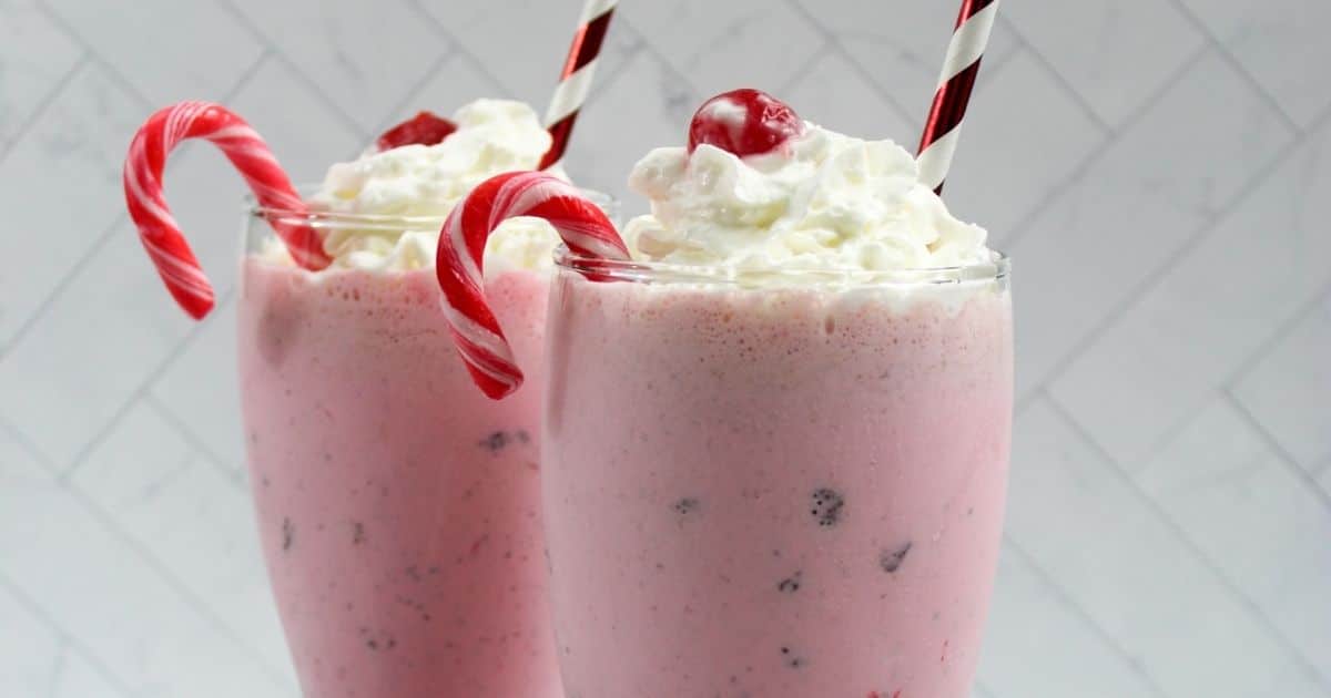 Rectangle image of the tops of two chickfila peppermint chip milkshakes