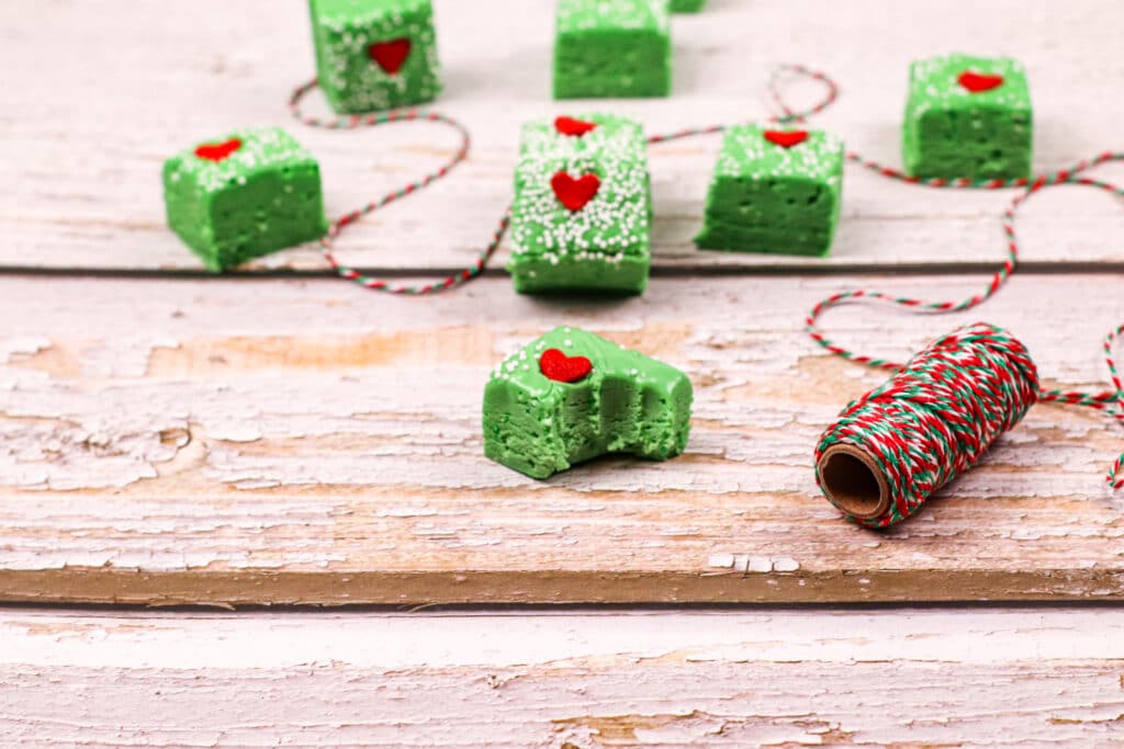 side view angle of grinch fudge on a wooden backdrop