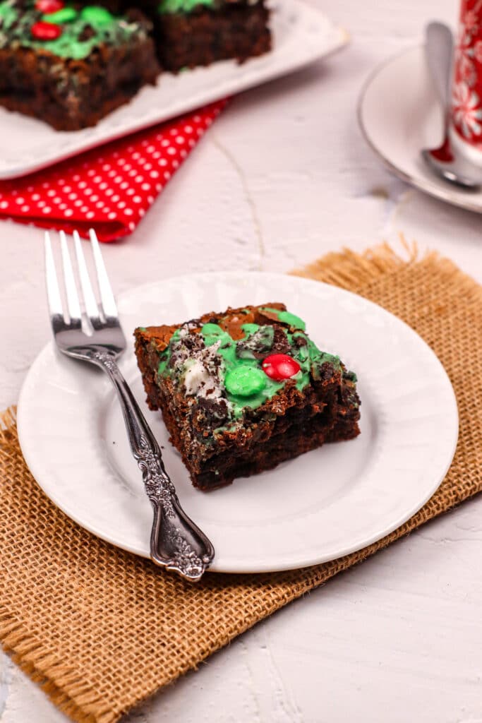 single grinch brownie on a white plate