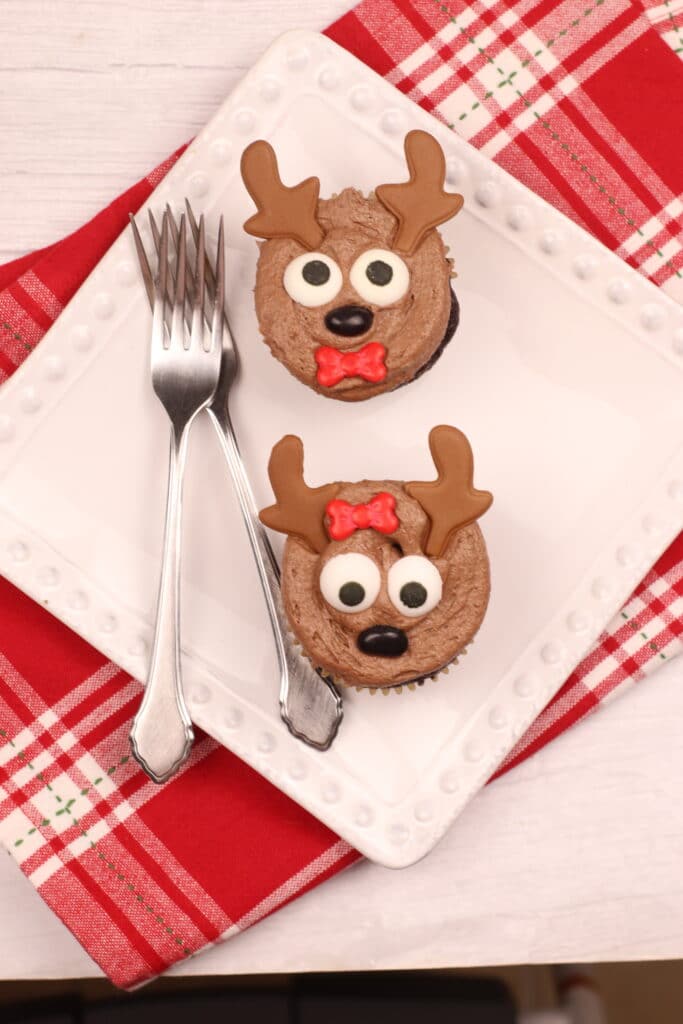 Two Reindeer Cupcakes on a White plate
