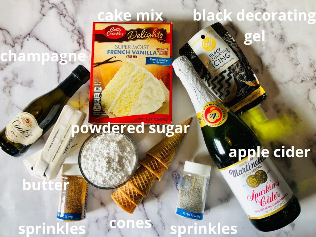 ingredients for new years cupcakes on a marble counter labeled with texts