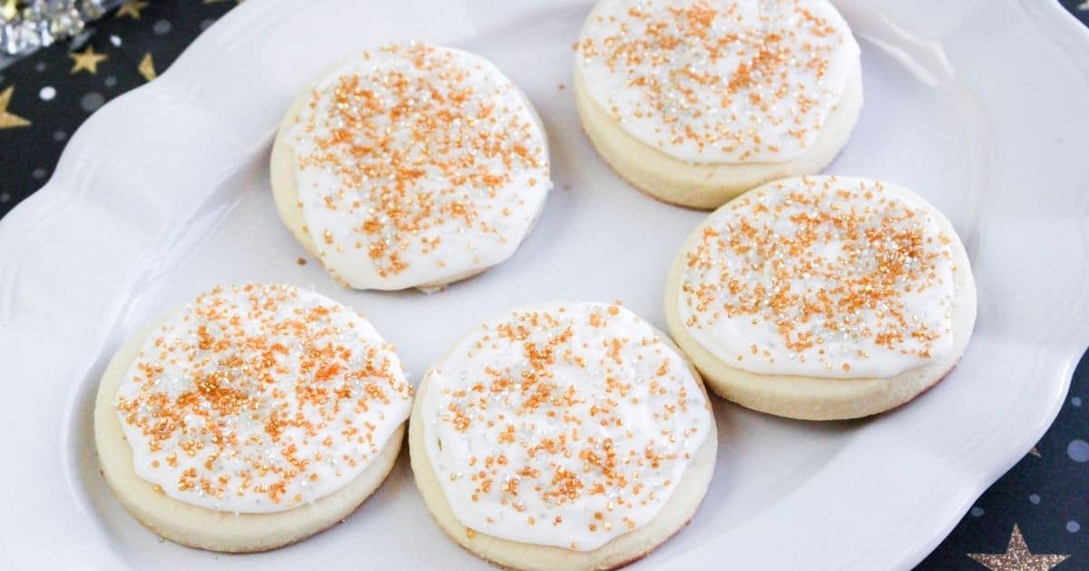 rectangle image of new years eve cookies on a white platter
