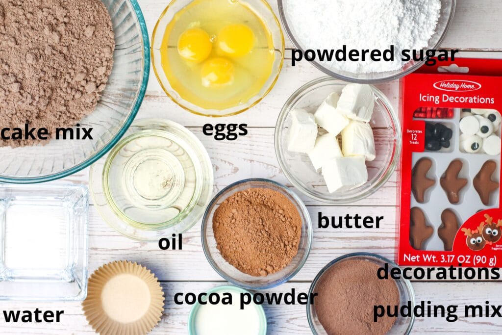 ingredients for rudolph cupcakes on a wooden background
