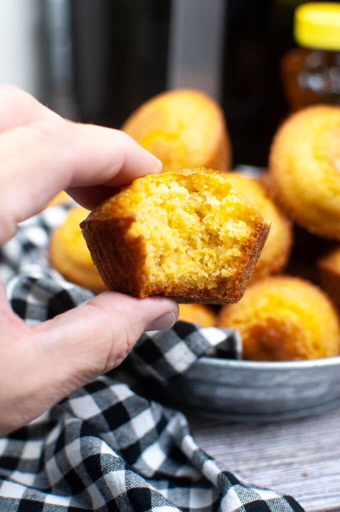 close up image of the inside of an air fryer cornbread muffin