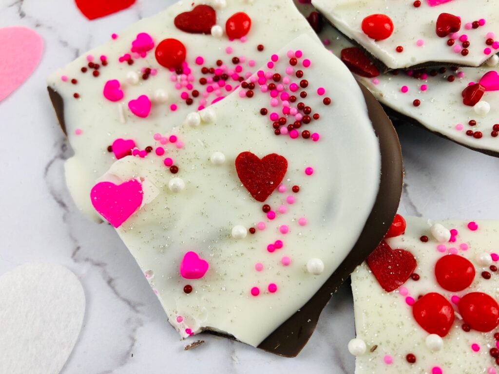 Close up of Valentine's Bark pieces on a marble counter