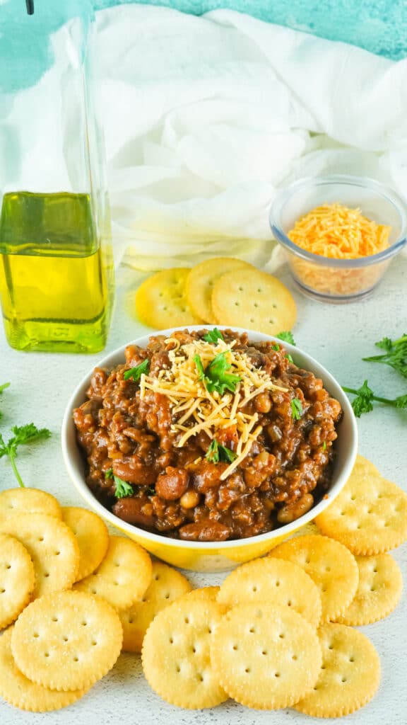 Bowl of smoked chili with a blue tinted background