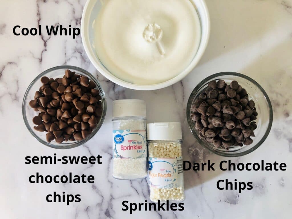 ingredients for cool whip candy on a white marble counter