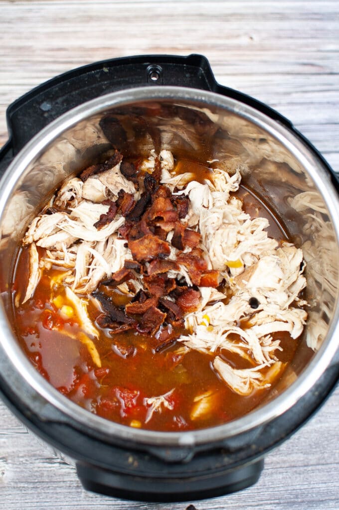 chicken, bacon, and veggies in a pressure cooker