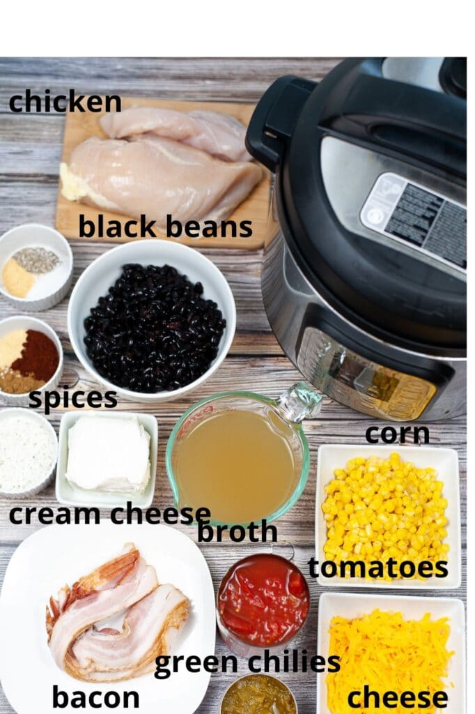 ingredients for instant pot crack chicken chili on a wooden background