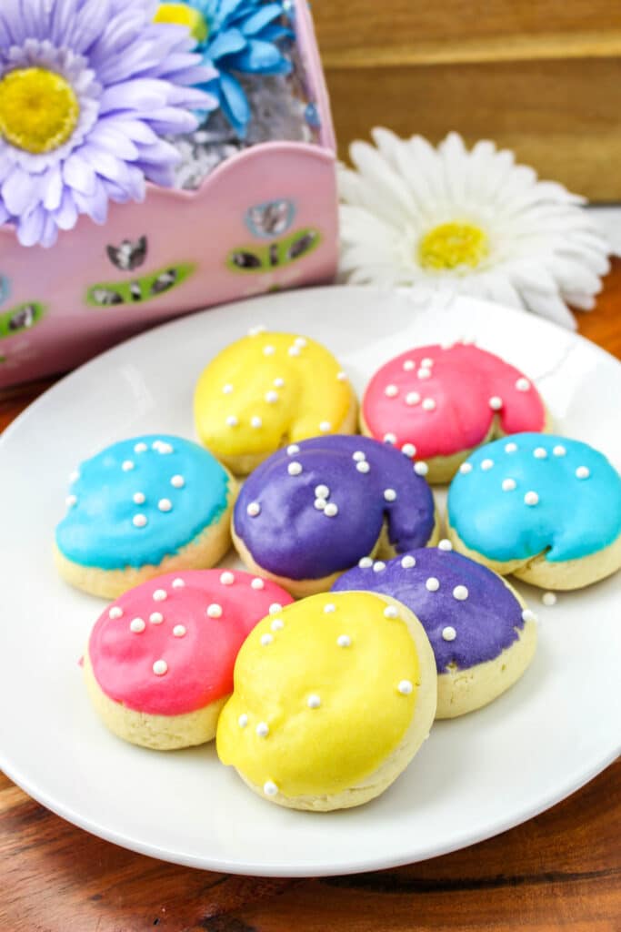 Italian Easter Cookies with colorful frosting on a white plate