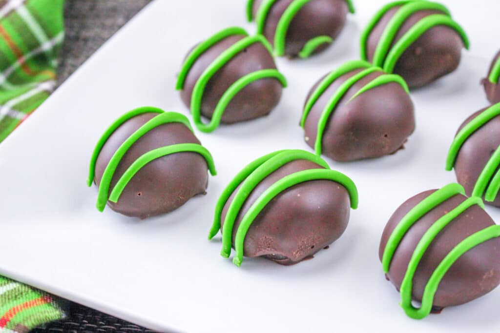 off center image of a plate of Mint Oreo Balls