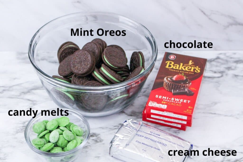 ingredients for mint oreo balls on a marble counter
