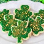 square image of st. patrick's day cookies on a white baking sheet