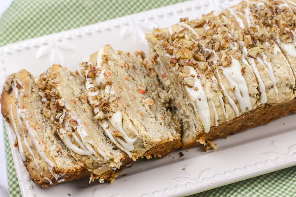 close up a carrot cake pound cake on a white platter