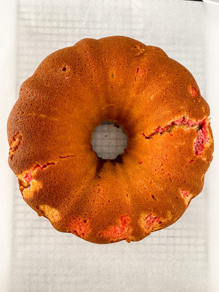 cooked bundt cake on a piece of parchment paper
