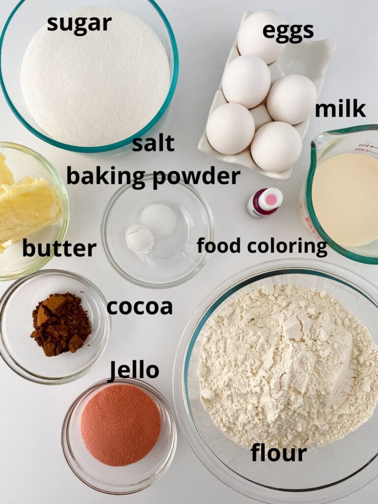 Neapolitan Bundt Cake ingredients on a white table labelled with text