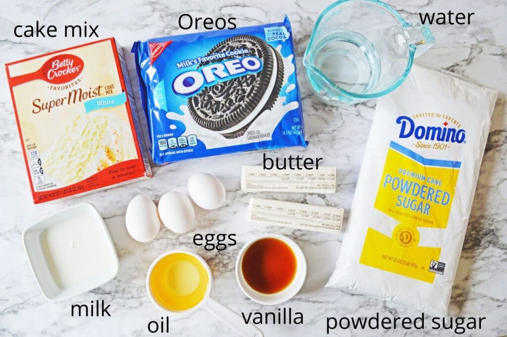 ingredients for oreo cupcakes on a marble counter