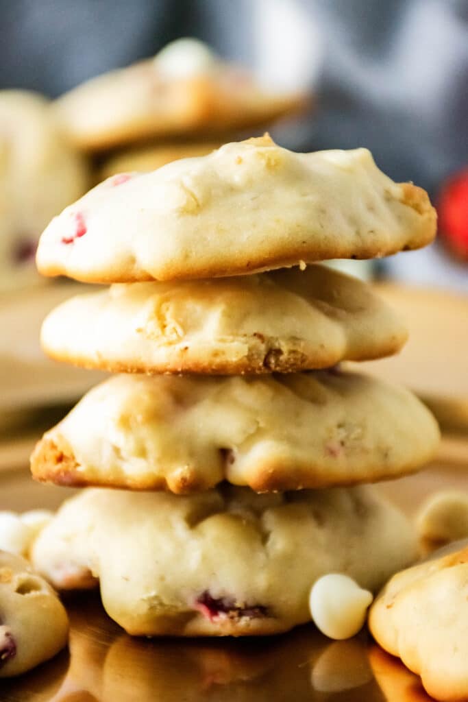 strawberry cheesecake cookies stacked on top of one another