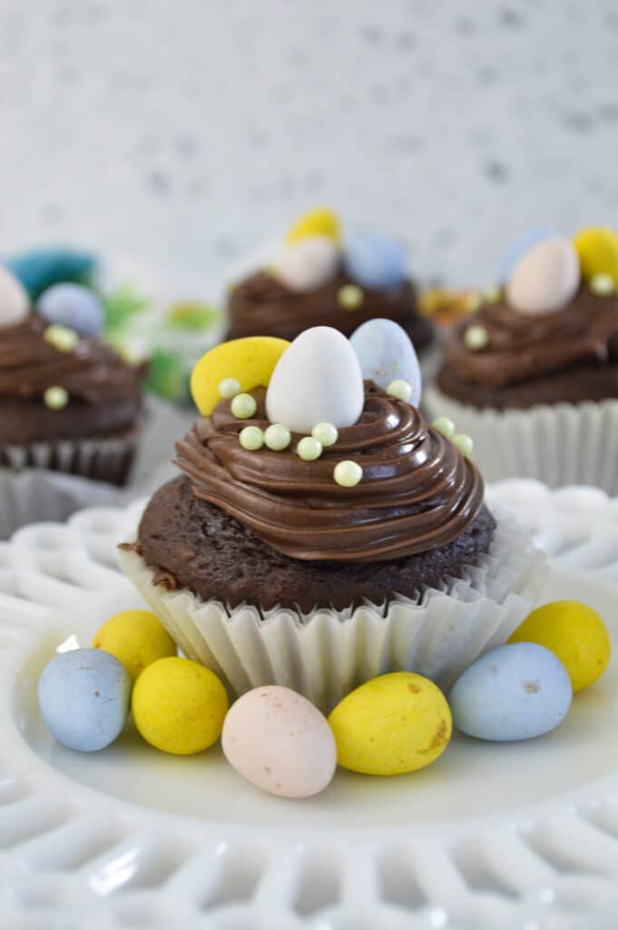 vertical image of Chocolate Mini Egg Cupcakes with mini eggs