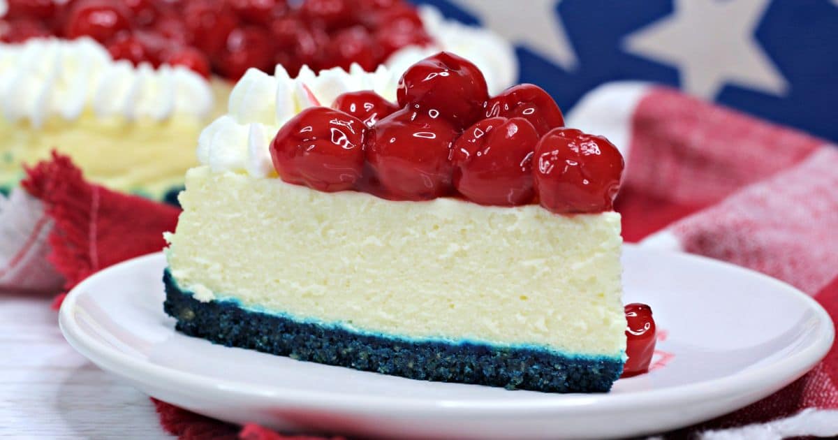 slice of patriotic cheesecake on a white plate