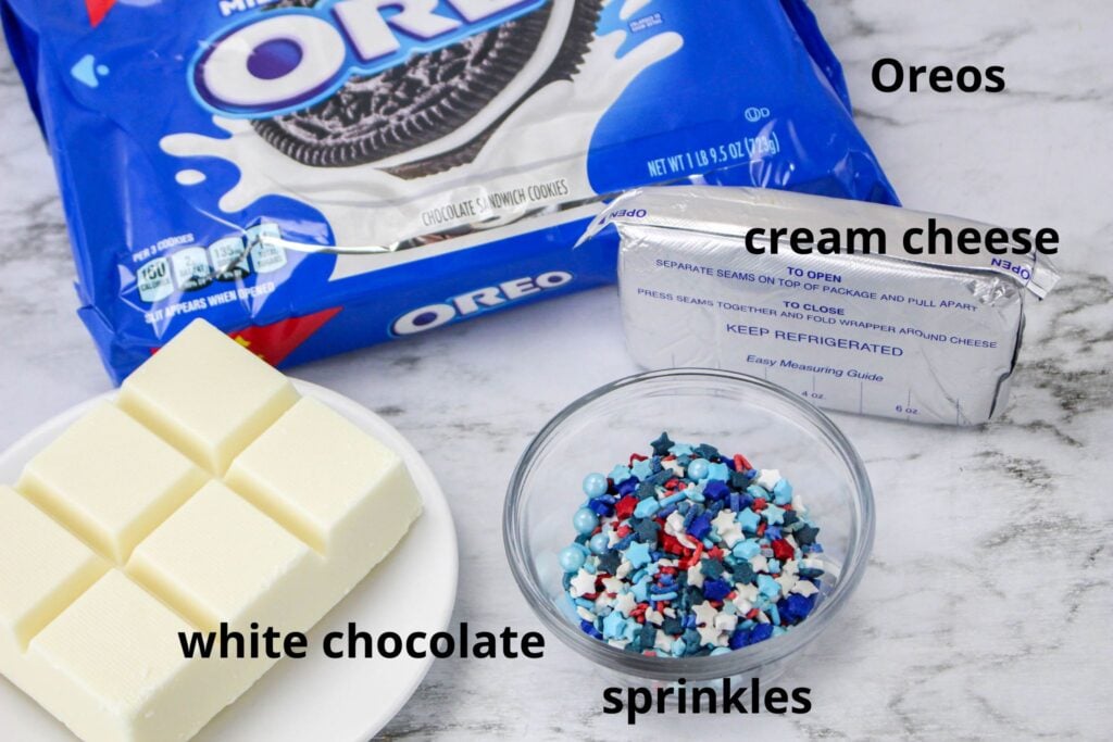 patriotic oreo balls ingredients on a marble counter