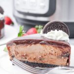 close up of a slice of Instant Pot Oreo Nutella Cheesecake