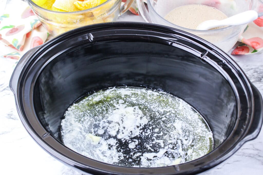 melted butter in a crockpot liner