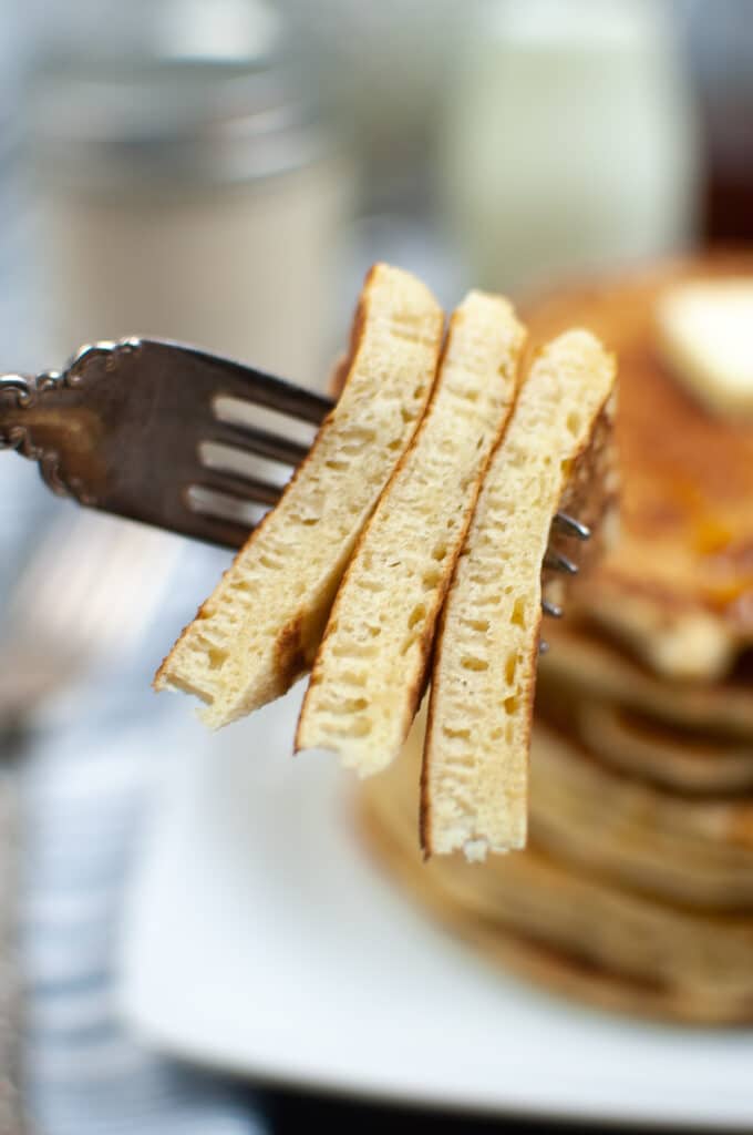 bite of sourdough pancakes on a fork
