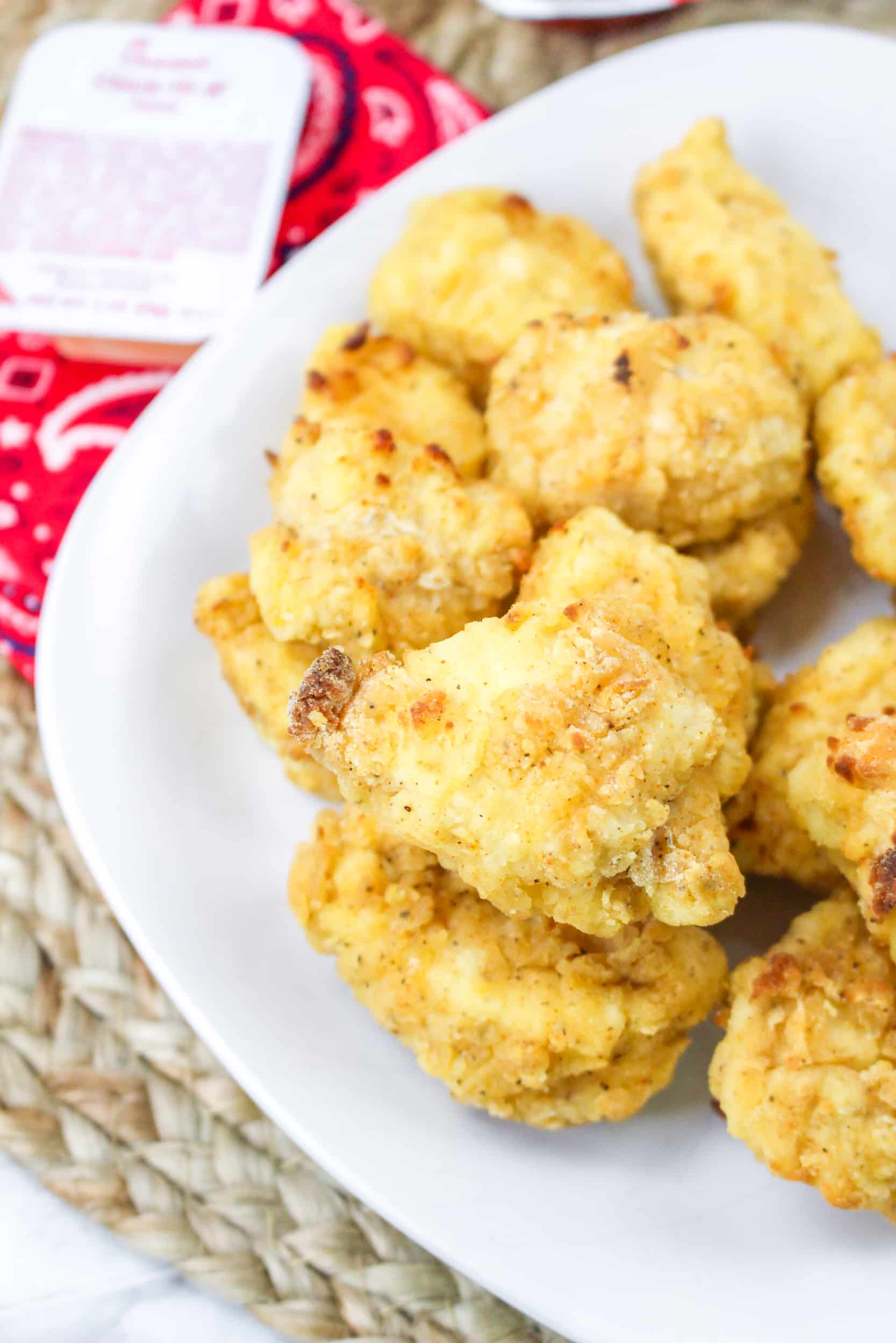 close up of a white plate filled with Air Fryer Copycat Chick-fil-a Nuggets