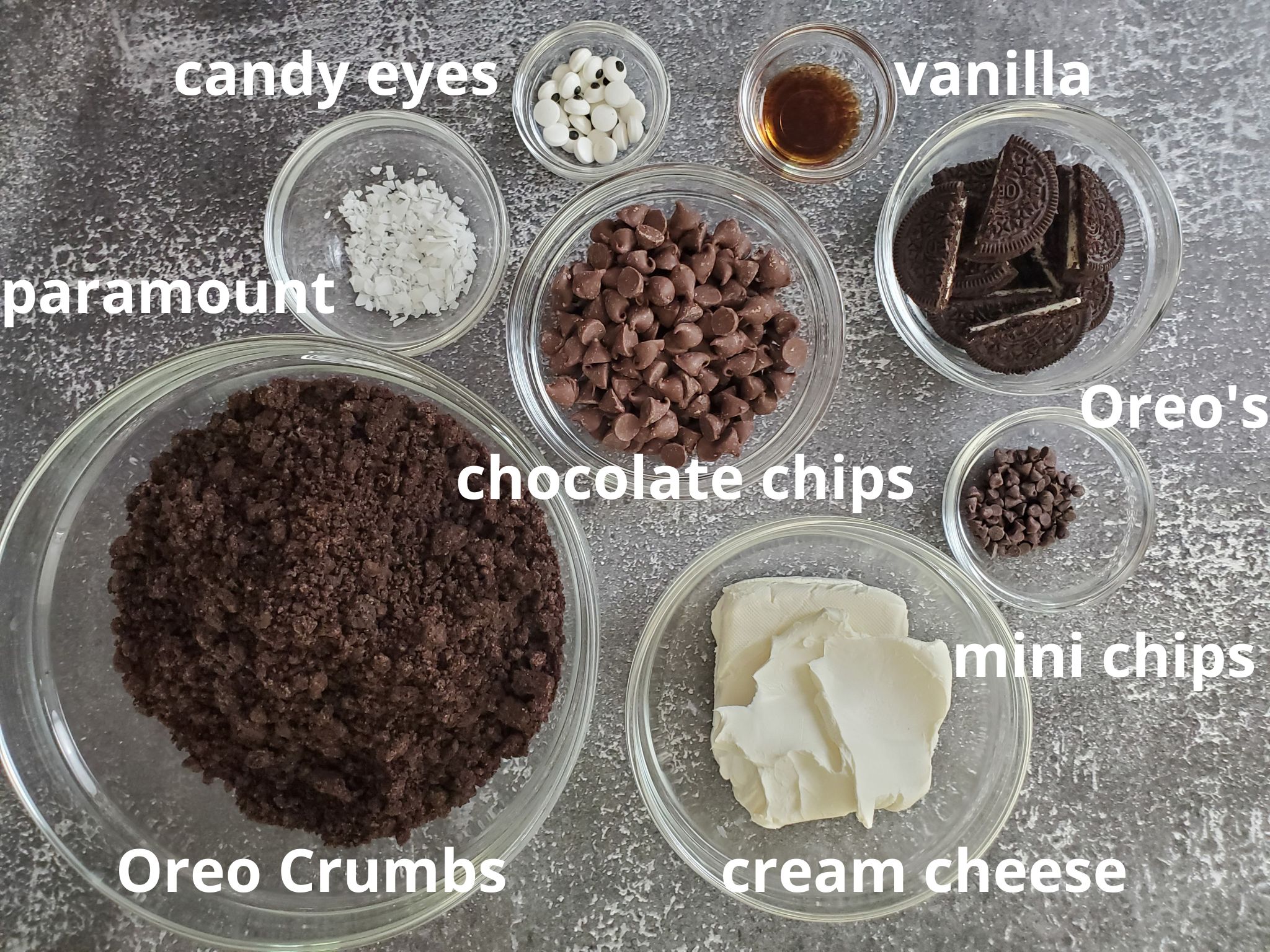 candy eyes, paramount, vanilla, oreos, chocolate chips, oreo crumbs, cream cheese, mini chocolate chips