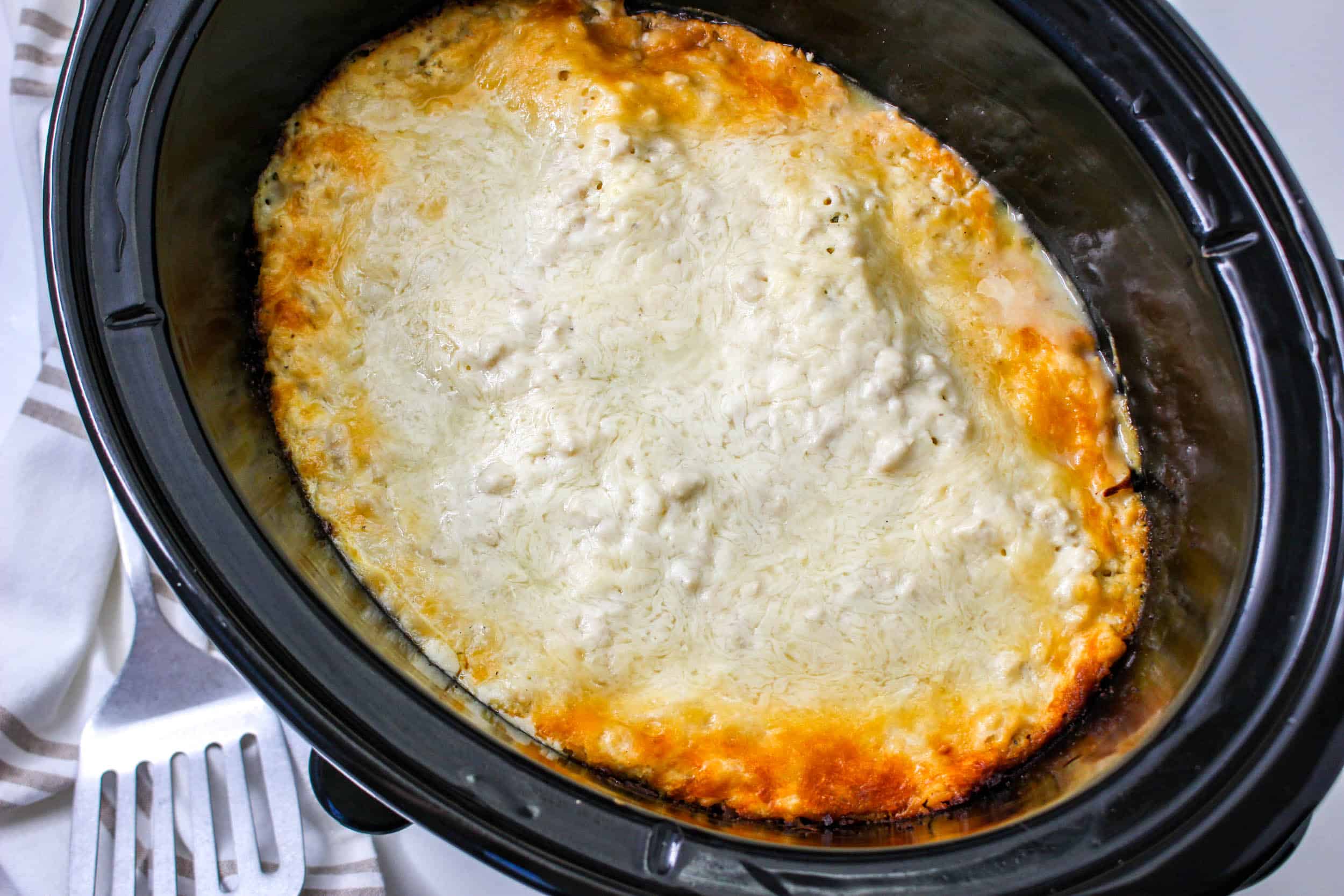 cooked slow cooker lasagna in crock pot