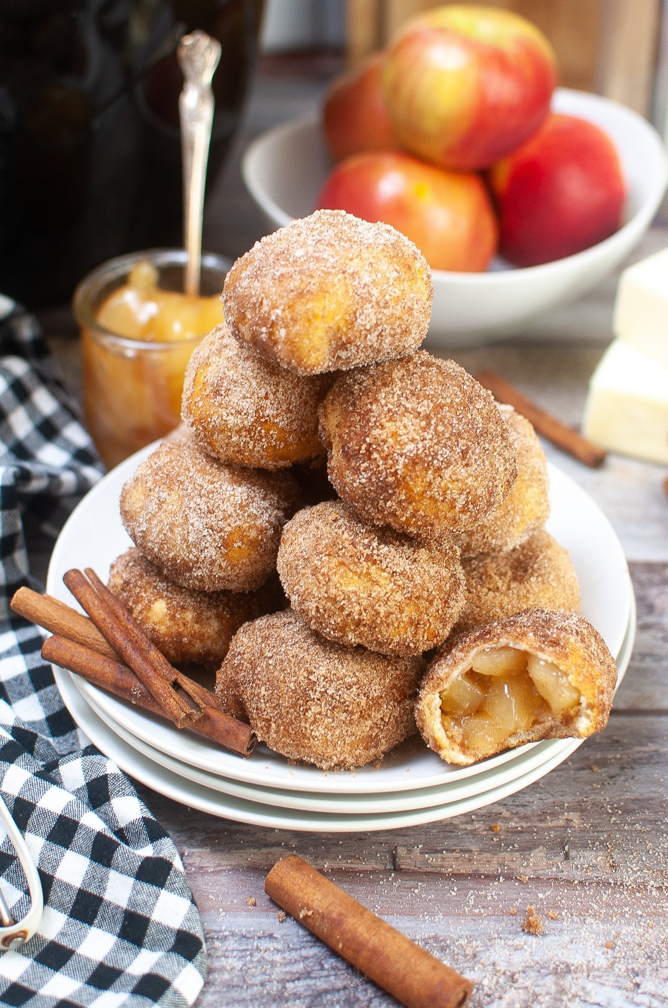 stack of air fryer apple bombs with one bitten open