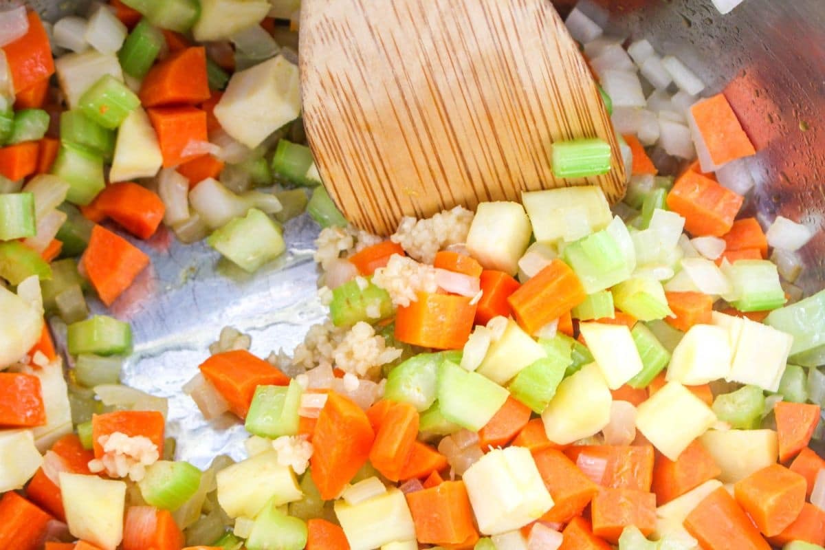 celery, carrots, onions and garlic in a pot