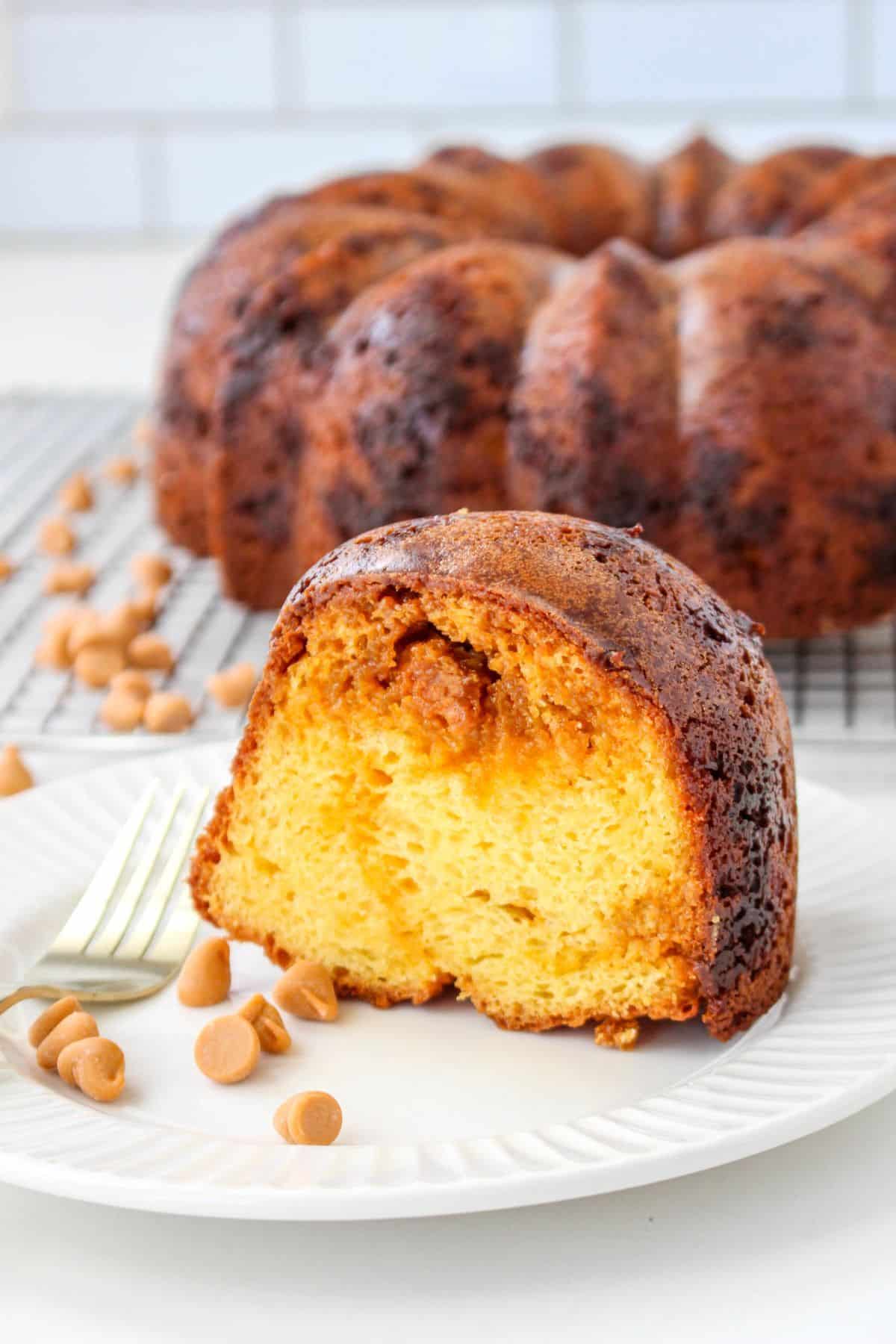 slice of butterscotch bundt cake on a white plate