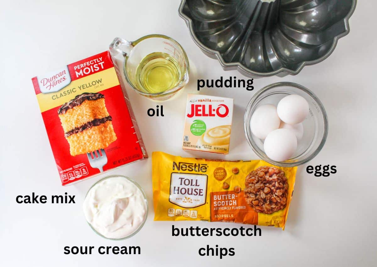 cake mix, oil, pudding, eggs, sour cream, butterscotch chips on a white background