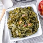 white bowl filled collard greens