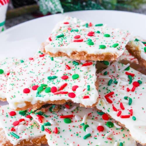 stack of white chocolate christmas crack on a white plate