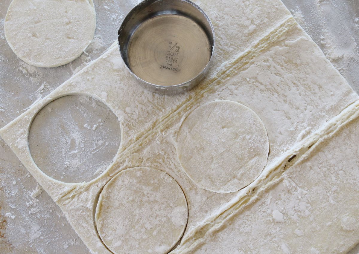 puff pastry being cut into circles