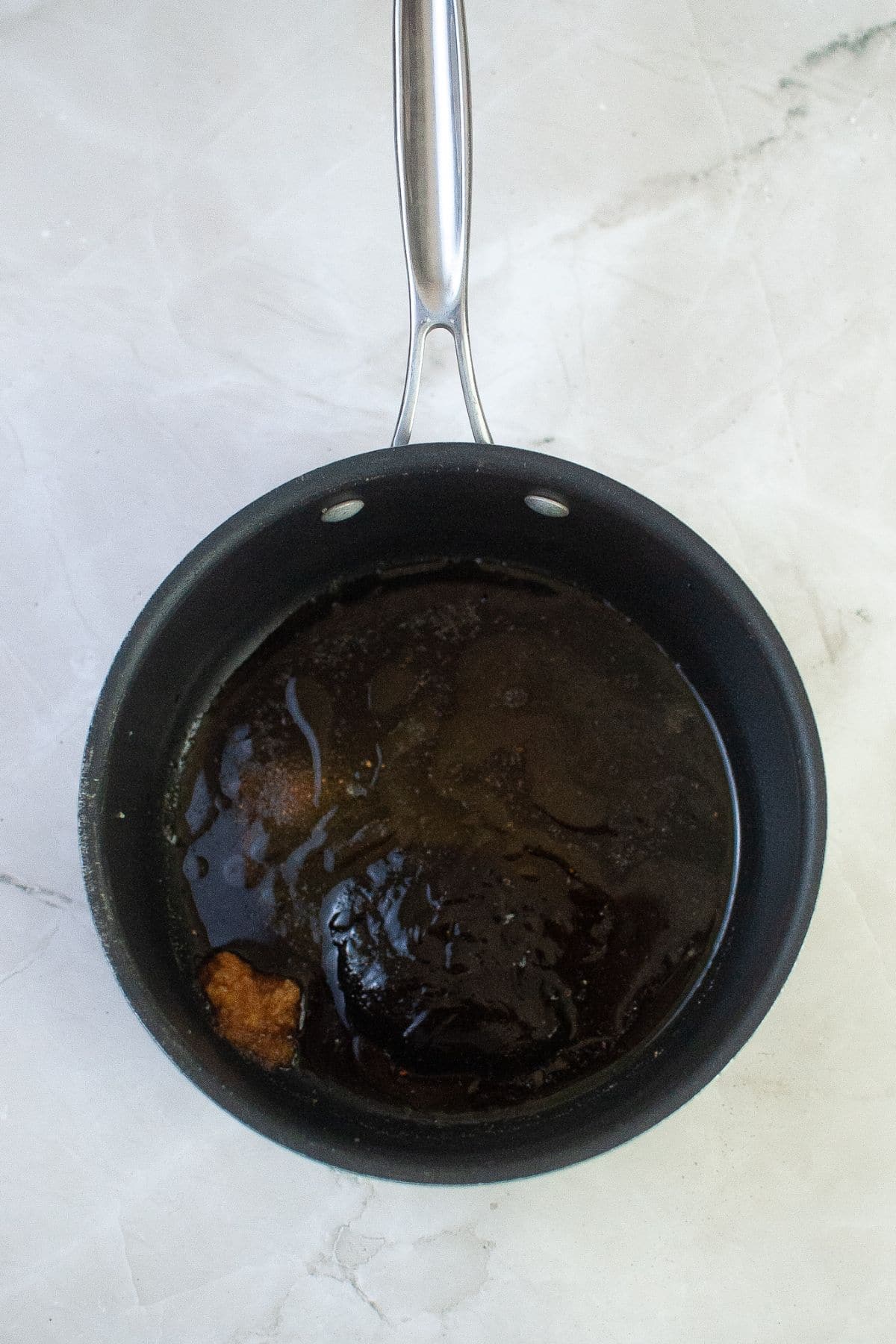 ginger, hosin sauce, and soy sauce in a saucepan
